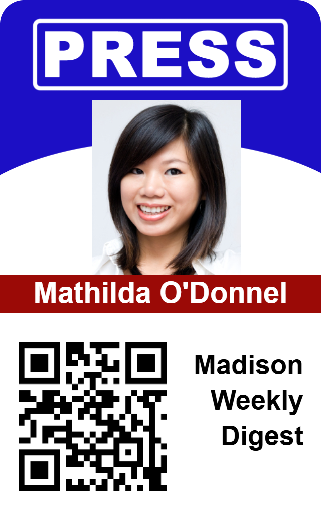 Template ID badge for Madison Weekly Digest with a smiling woman’s photo, name, QR code below details; waterproof, wear resistant, added security holographic overlay option