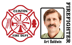 Template ID badge featuring the Clinton Fire Dept logo beside a portrait of a man with light brown hair and mustache, "Firefighter" label on the side; waterproof, durable PVC option