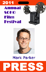Template for id badge with a film projector icon at the 2011 SOHO Film Festival, featuring a man's photo with glasses, plus clear overlay and durable PVC options