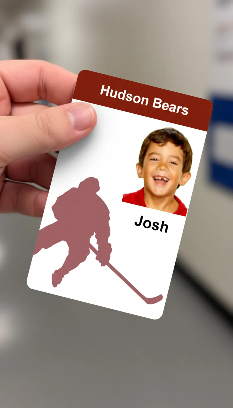 Red and white, JV hockey team ID card with holographic overlay, featuring text fields and a photo area.