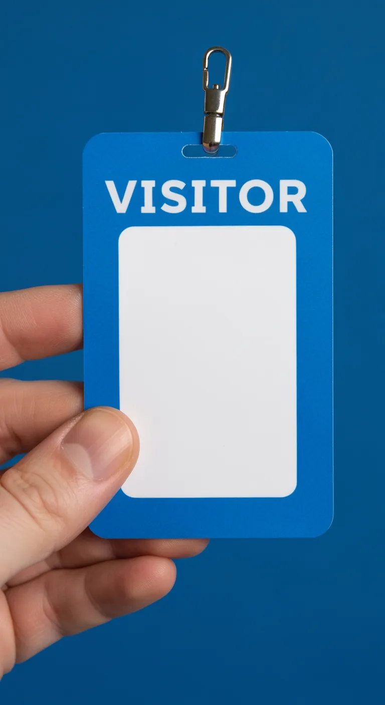 Blue and white professional ID badge, blank, held by hand, solid blue background.