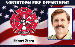 Northtown Fire Department ID card template displaying the fire rescue logo and a portrait of a man with light brown hair and mustache. Durable PVC, waterproof, wear resistant
